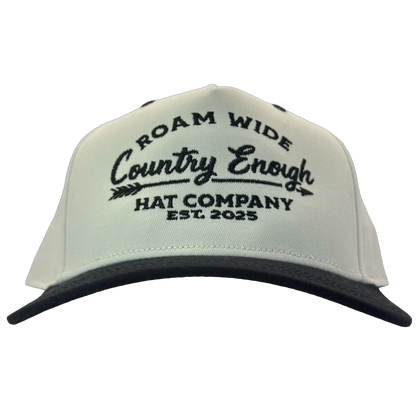 legacy heritage snapback with graphic of arrow and words roam wide, country enough hat company est. 2025 #black