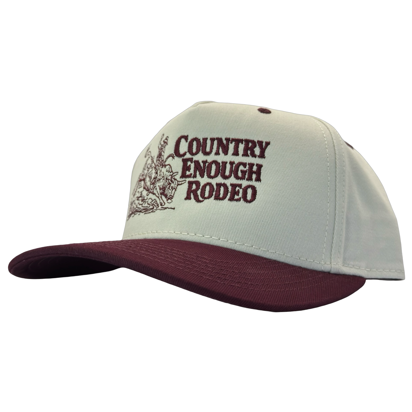 Legacy heritage snapback hat with graphic of bull rider on a bucking bull and the words country enough rodeo #wine