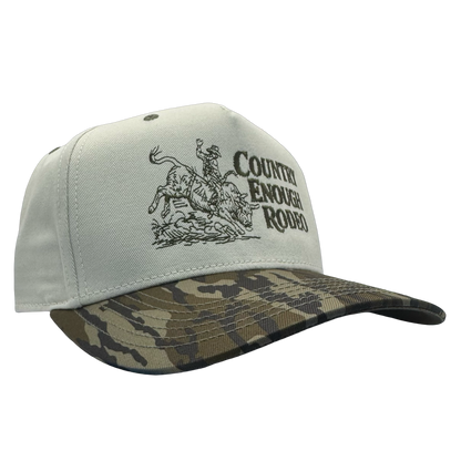 Legacy heritage snapback hat with graphic of bull rider on a bucking bull and the words country enough rodeo #bottomland