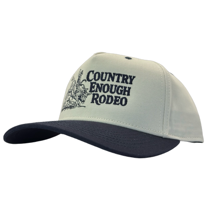 Legacy heritage snapback hat with graphic of bull rider on a bucking bull and the words country enough rodeo #navy