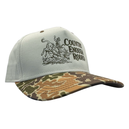 Legacy heritage snapback hat with graphic of bull rider on a bucking bull and the words country enough rodeo #duckcamo