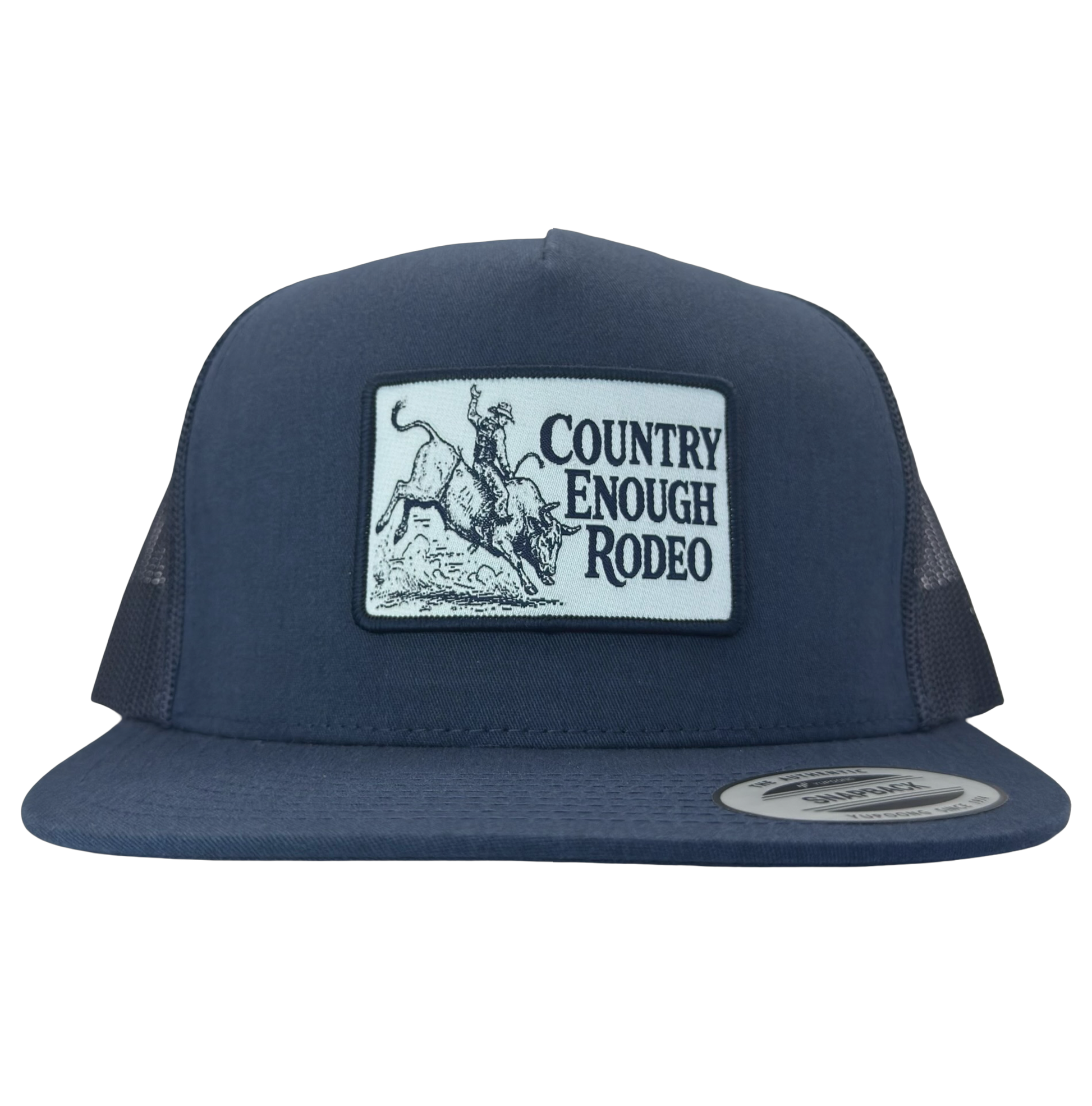 Yupoong 6006 flat bill snapback with a patch that contains graphic of a bullrider and bucking bull and words country enough rodeo #navy