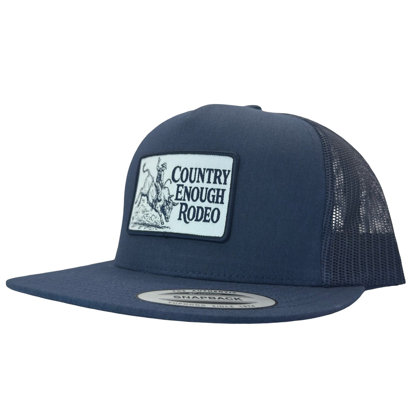Yupoong 6006 flat bill snapback with a patch that contains graphic of a bullrider and bucking bull and words country enough rodeo #navy