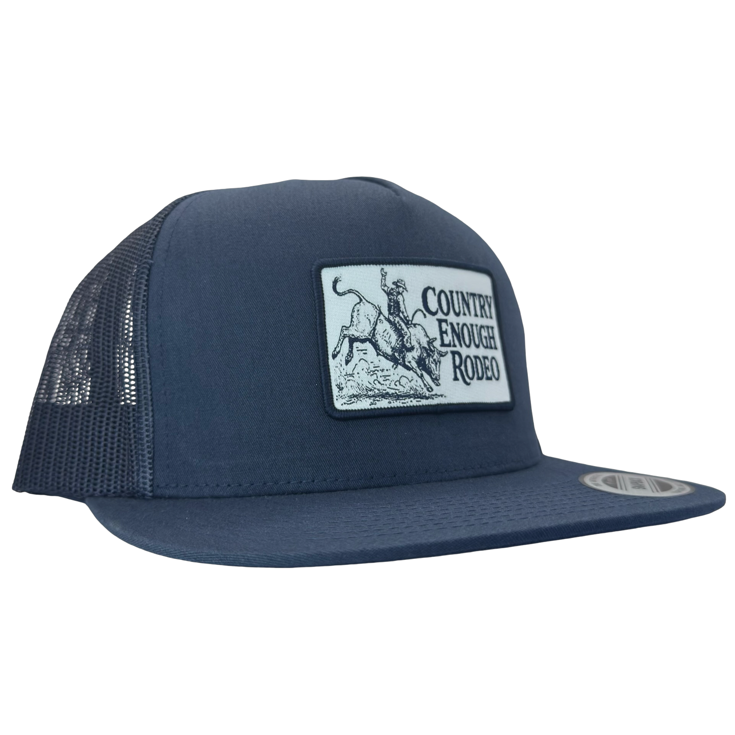 Yupoong 6006 flat bill snapback with a patch that contains graphic of a bullrider and bucking bull and words country enough rodeo #navy