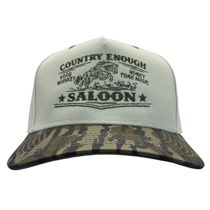 legacy heritage snapback hat with graphic of bucking horse and words country enough saloon, good whiskey, and honkey tonk music #bottomland