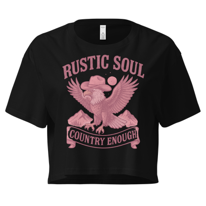 Black crop top with graphic of cowboy hat wearing eagle, mountains, and words rustic soul and country enough #black