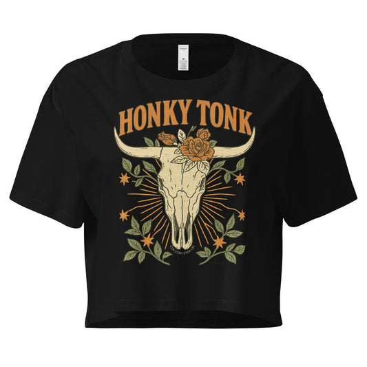 Black crop top with graphic of bull skull and flowers with words honky tonk across the top #black