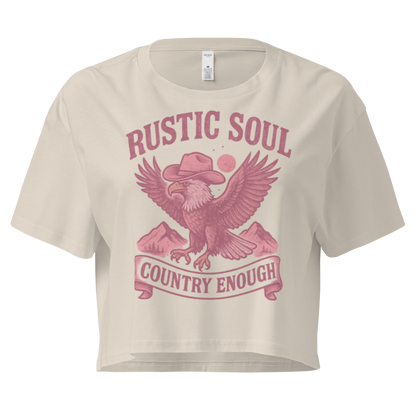 Bone crop top with graphic of cowboy hat wearing eagle, mountains, and words rustic soul and country enough #bone