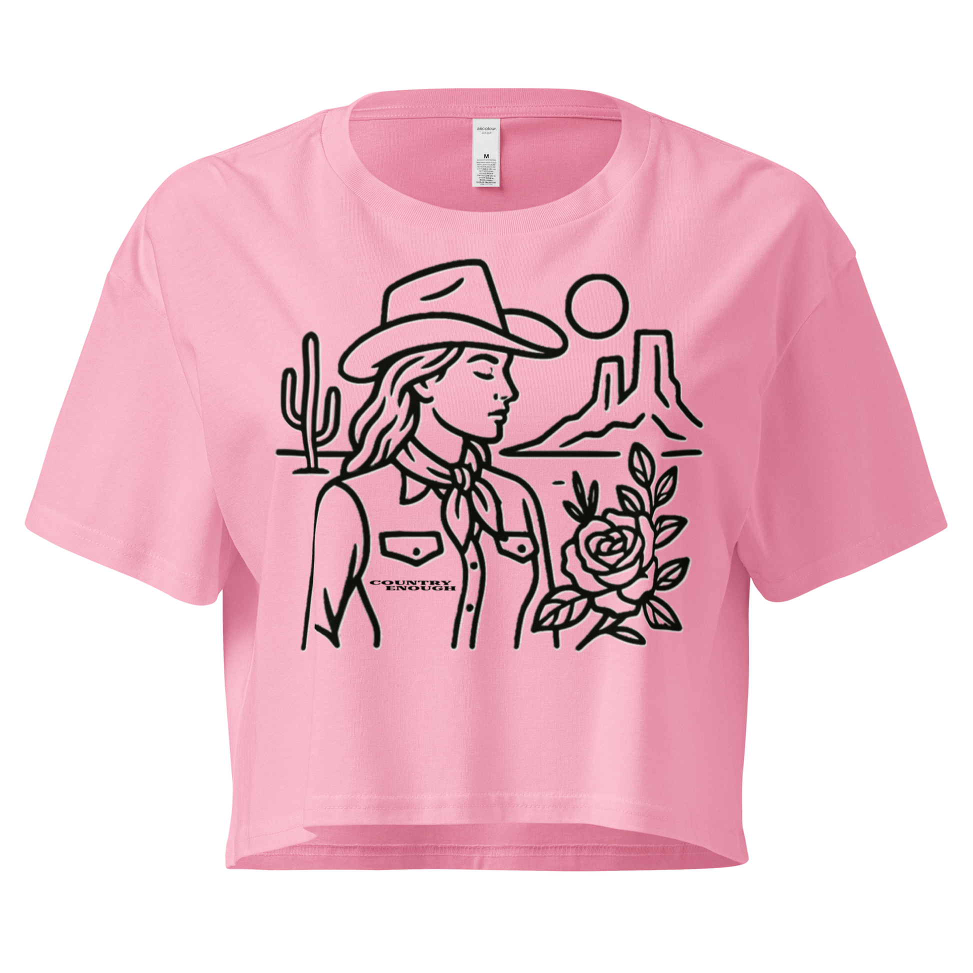 Pink crop top with graphic of a cowgirl, desert landscape, sun, cacti, and rose #pink