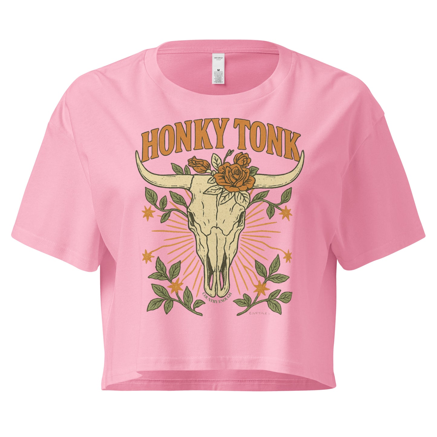 Pink crop top with graphic of bull skull and flowers with words honky tonk across the top #pink
