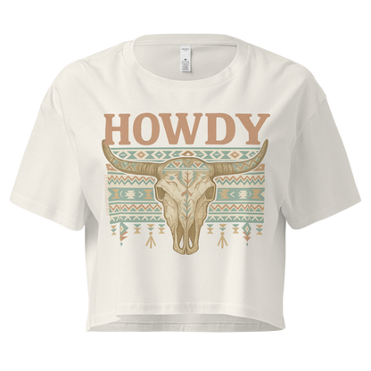 Ecru crop top with graphic of bull skull, aztec pattern, and the word howdy #ecru