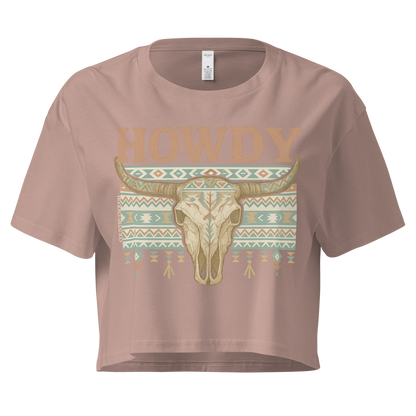 Hazy Pink crop top with graphic of bull skull, aztec pattern, and the word howdy #hazypink