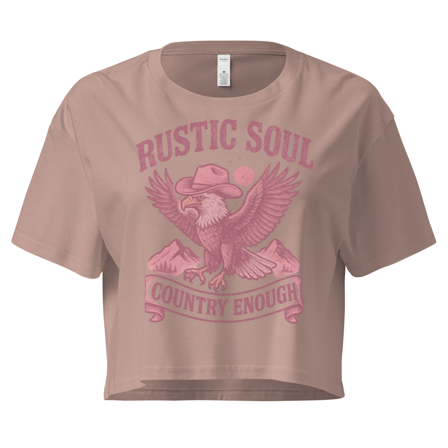 Hazy Pink crop top with graphic of cowboy hat wearing eagle, mountains, and words rustic soul and country enough #hazypink