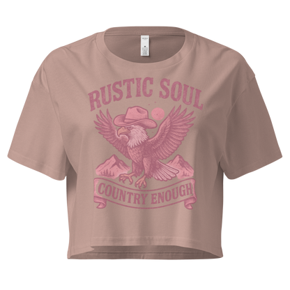 Hazy Pink crop top with graphic of cowboy hat wearing eagle, mountains, and words rustic soul and country enough #hazypink