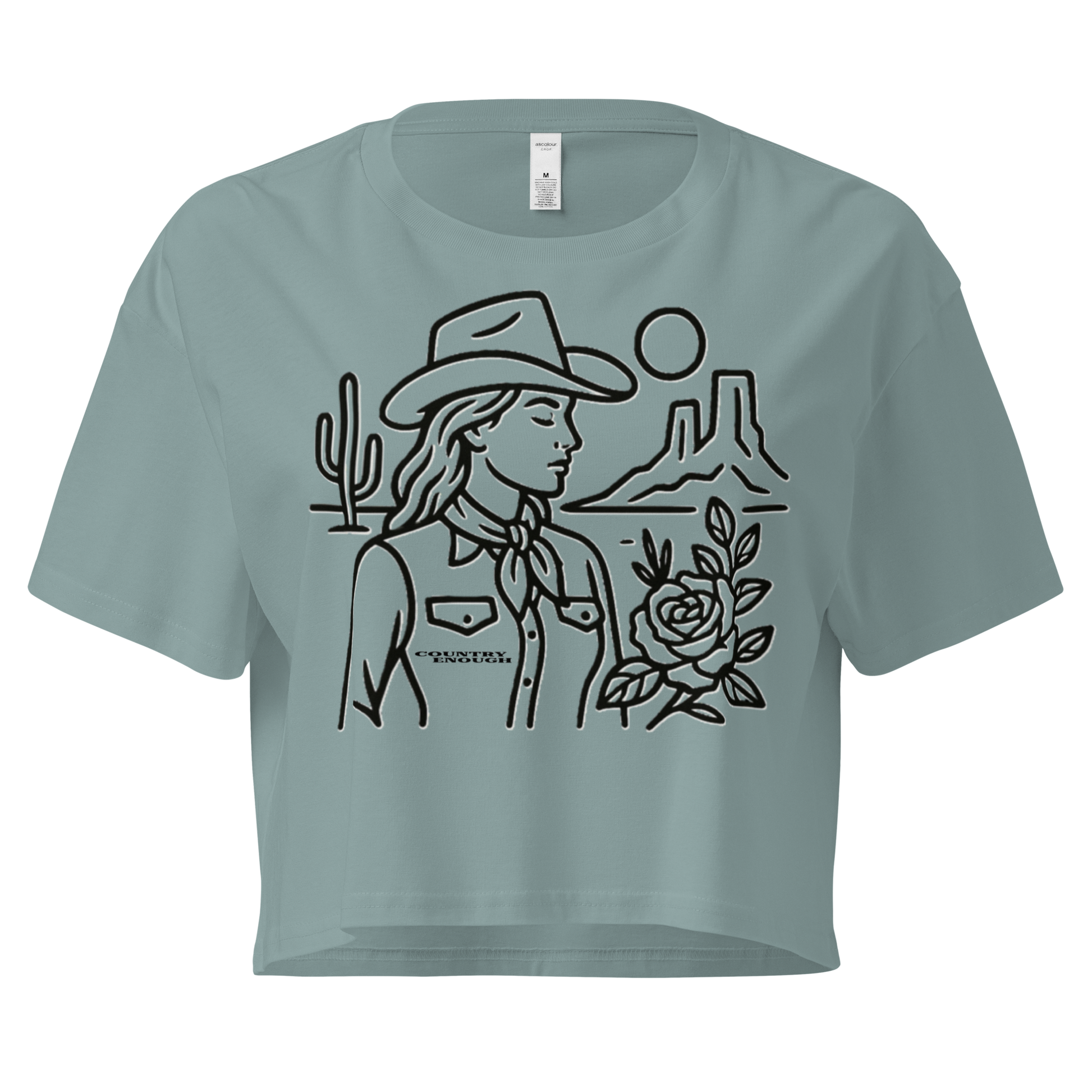 Mineral crop top with graphic of a cowgirl, desert landscape, sun, cacti, and rose #mineral