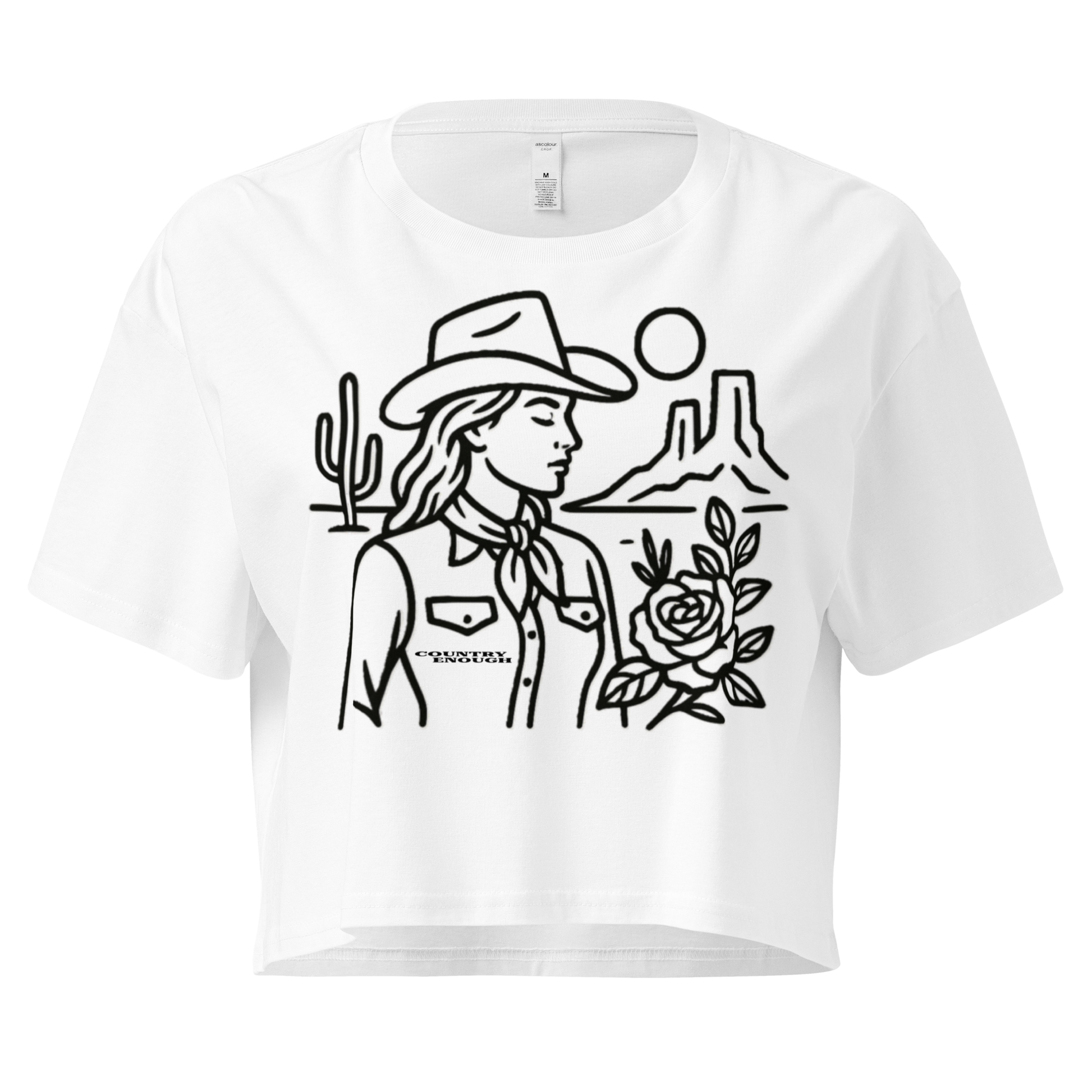 White crop top with graphic of a cowgirl, desert landscape, sun, cacti, and rose #white