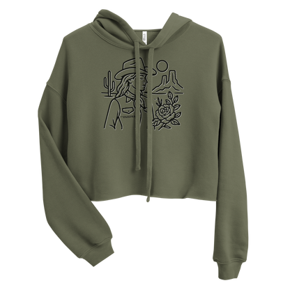 Military Green crop hoodie with graphic of a cowgirl, desert landscape, sun, cacti, and rose #militarygreen