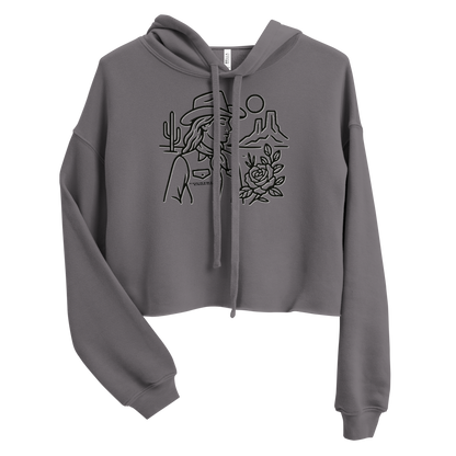 Gray crop hoodie with graphic of a cowgirl, desert landscape, sun, cacti, and rose #gray