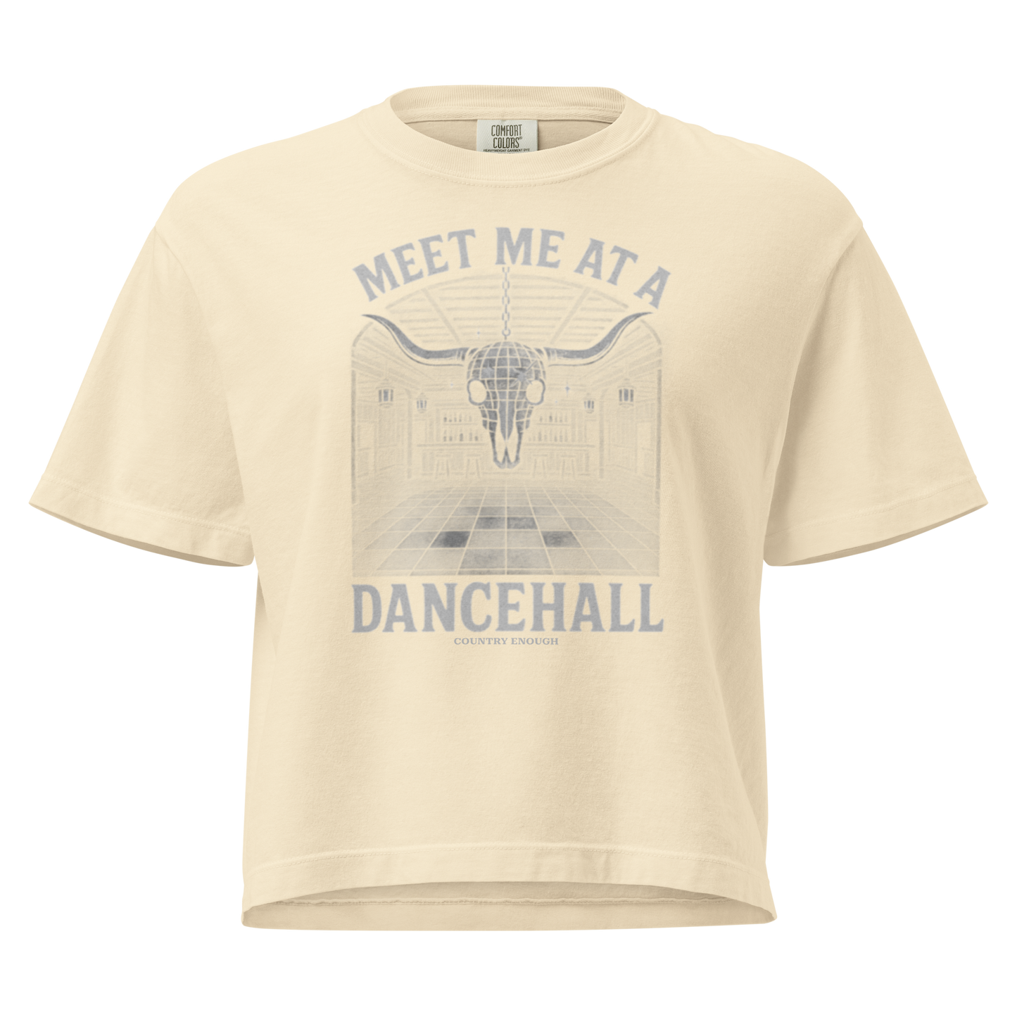 Ivory t-shirt with graphic of a bar scene, bull skull shaped disco ball, and the words meet me at a dancehall #ivory