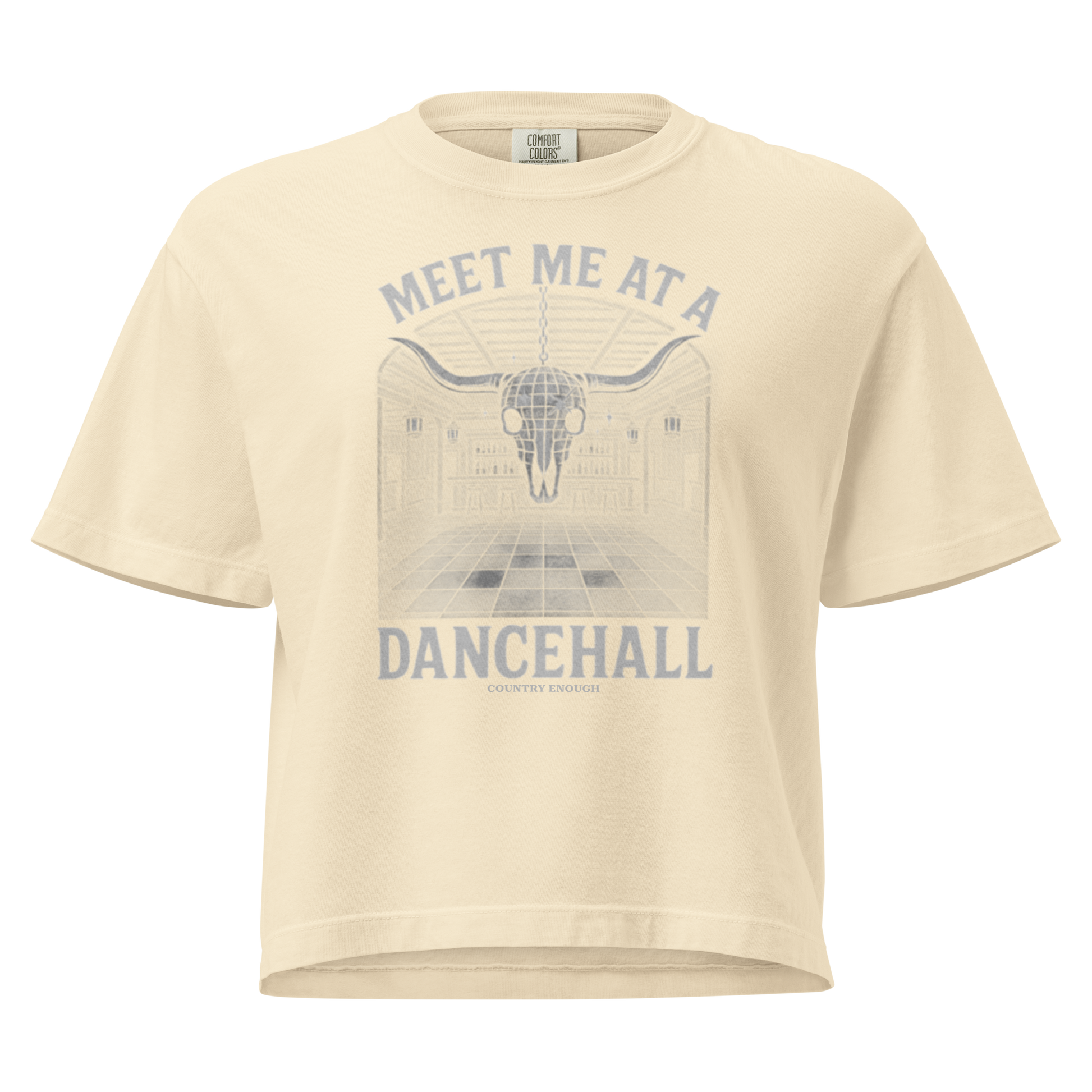Ivory t-shirt with graphic of a bar scene, bull skull shaped disco ball, and the words meet me at a dancehall #ivory