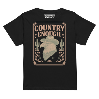 Black t-shirt with graphic of cowboy hat and bandana wearing eagle, cacti, and western border with words country enough #black