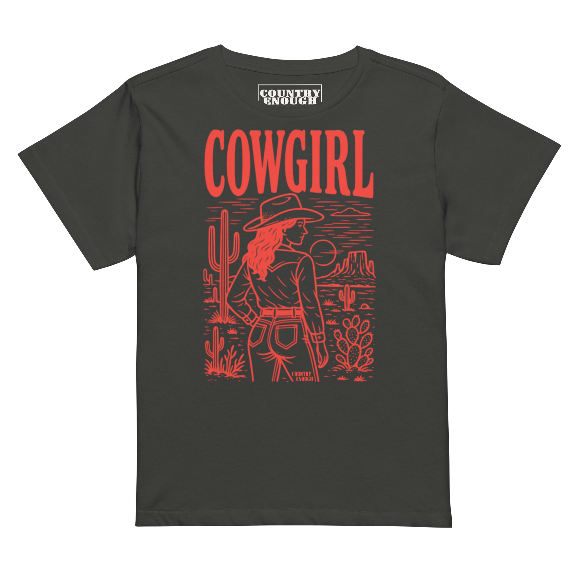 Vintage Black t-shirt of cowgirl standing in a desert scene with words cowgirl. all in bright red coloring #vintageblack