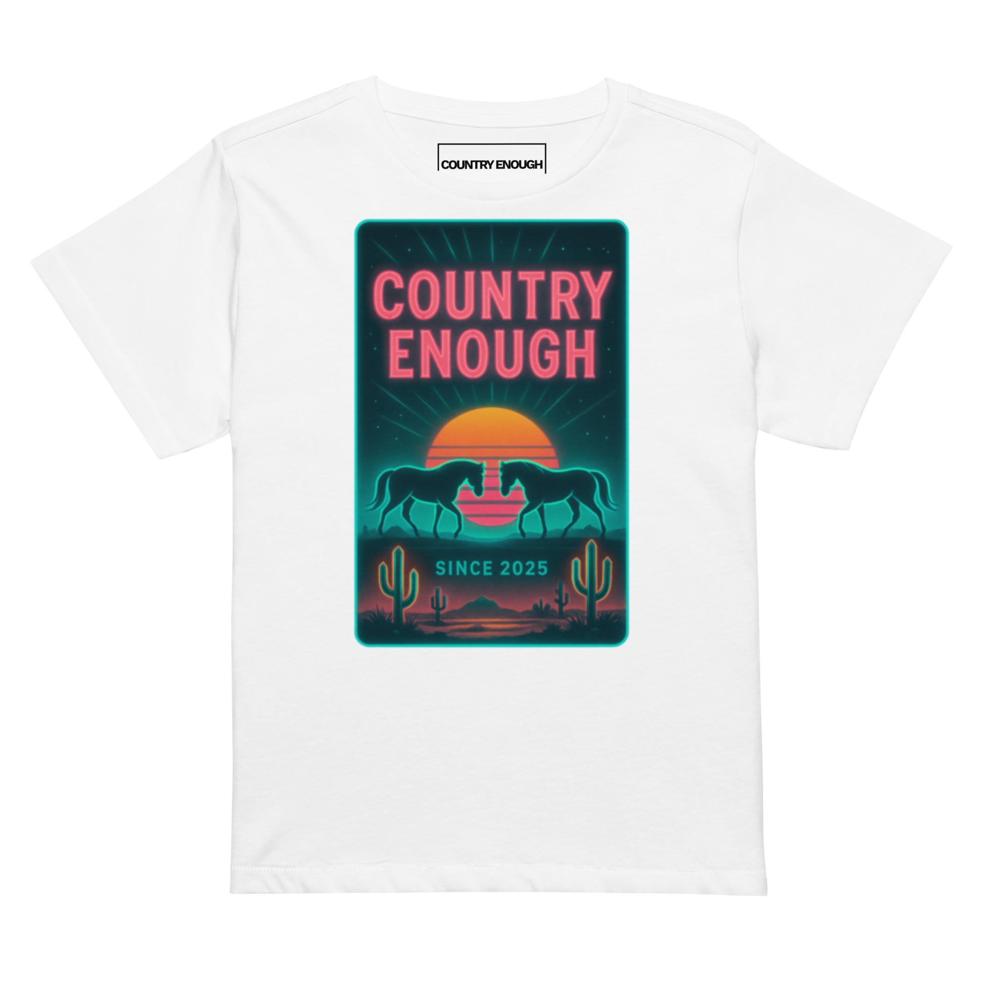 White t-shirt with graphic of horses, cacti, desert landscape, and sunshine with words country enough #white