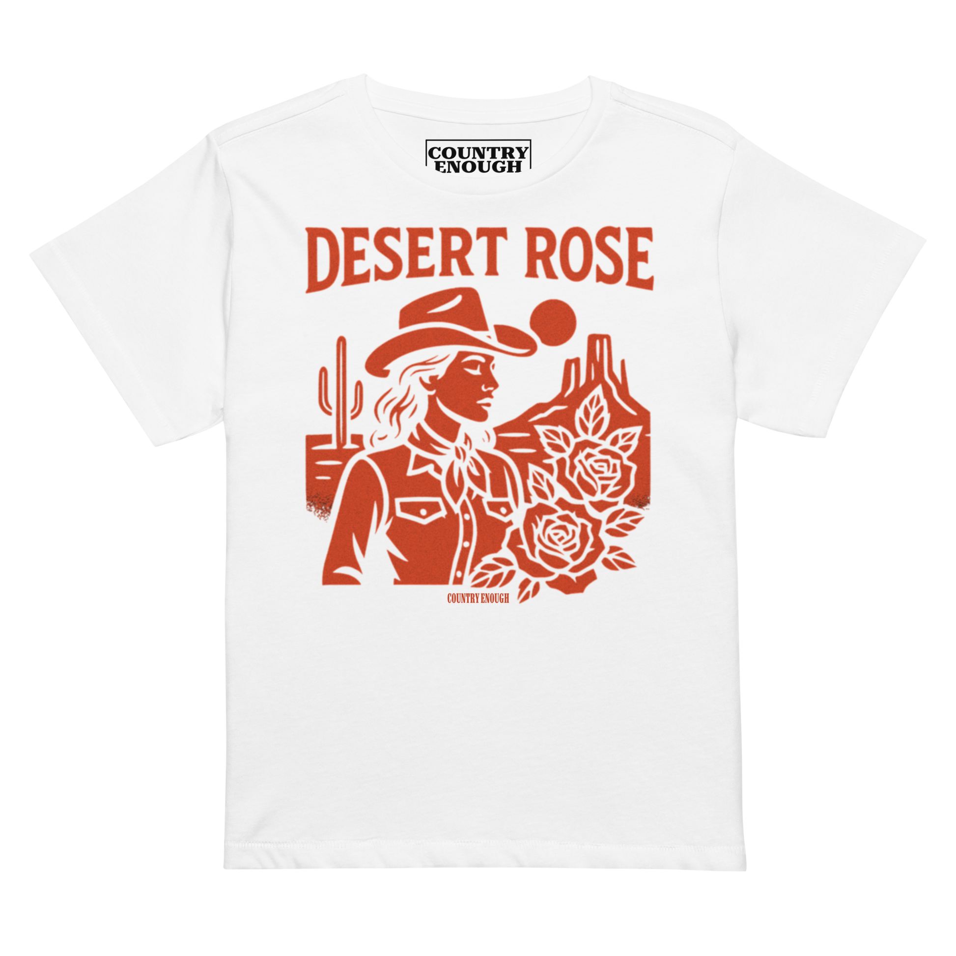 White t-shirt with graphic of cowgirl, desert landscape, roses, and words desert rose #white