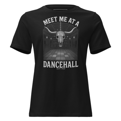 Black t-shirt with graphic of a bar scene, bull skull shaped disco ball, and words meet me at a dancehall, all in gray #black