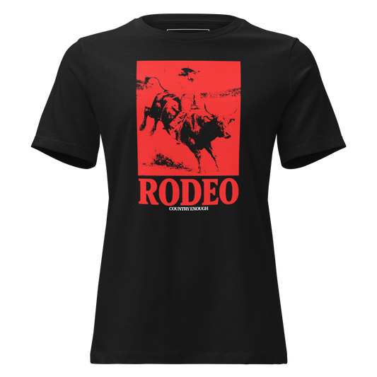 Black t-shirt with bright red graphic of a cowgirl riding a bull and the word rodeo below #black
