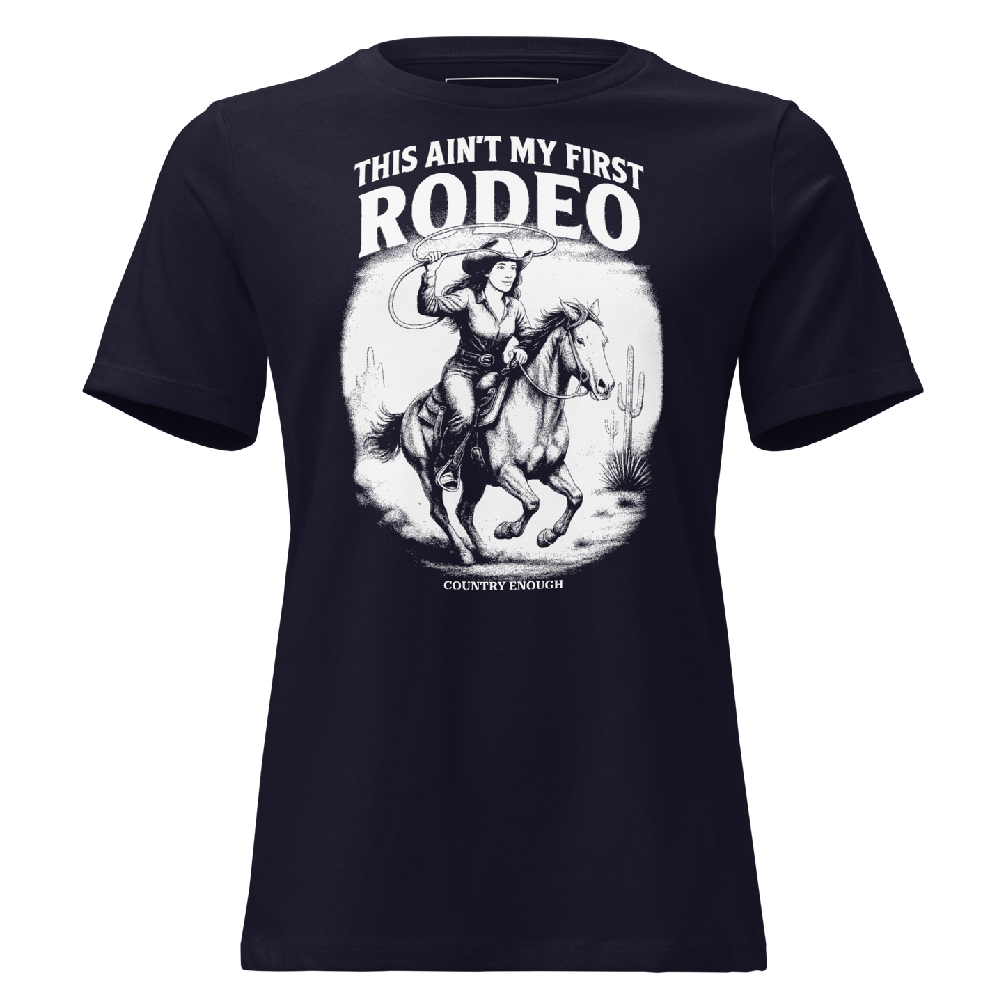 Navy t-shirt with graphic of cowgirl and horse lassoing in a desert scene with the words this ain't my first rodeo and country enough #navy
