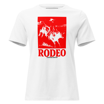 White t-shirt with bright red graphic of a cowgirl riding a bull and the word rodeo below #white