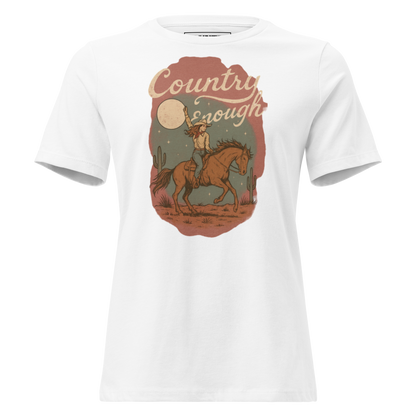White t-shirt with cowgirl and horse graphic featuring a western landscape under moon and stars #white