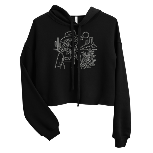 Black crop hoodie with graphic of a cowgirl, desert landscape, sun, cacti, and rose #black