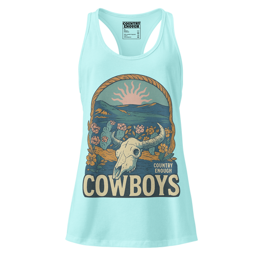 Women's tank top with graphic of bison skull, sun, mountains, flowers and cacti with a rope border and the word cowboys below #cancun
