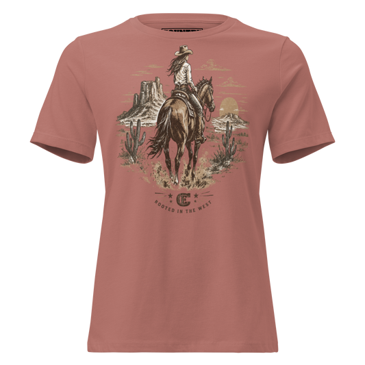 cowgirl head west on a horse in the desert landscape with the sun setting in the distance with ce logo and words rooted in the west #mauve