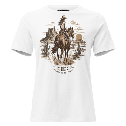 cowgirl head west on a horse in the desert landscape with the sun setting in the distance with ce logo and words rooted in the west #white
