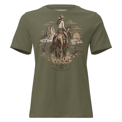 cowgirl head west on a horse in the desert landscape with the sun setting in the distance with ce logo and words rooted in the west #militarygreen