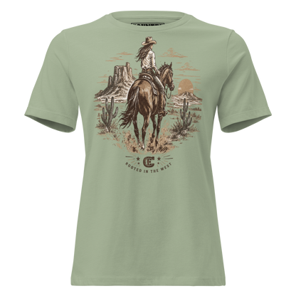 cowgirl head west on a horse in the desert landscape with the sun setting in the distance with ce logo and words rooted in the west #sage
