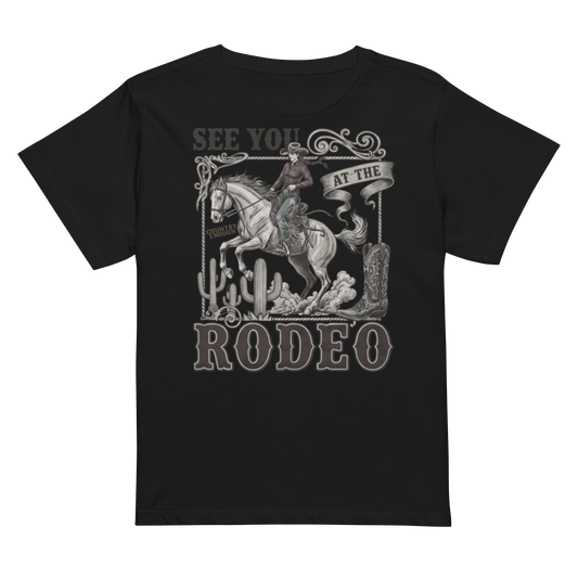 Women's high waist t-shirt with graphic of cowgirl, cowboy boot, cacti, horse, and words see you at the rodeo #black