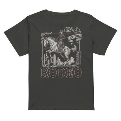 Women's high waist t-shirt with graphic of cowgirl, cowboy boot, cacti, horse, and words see you at the rodeo #vintageblack