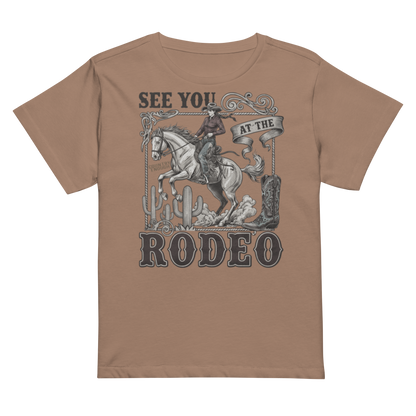 Women's high waist t-shirt with graphic of cowgirl, cowboy boot, cacti, horse, and words see you at the rodeo #latte