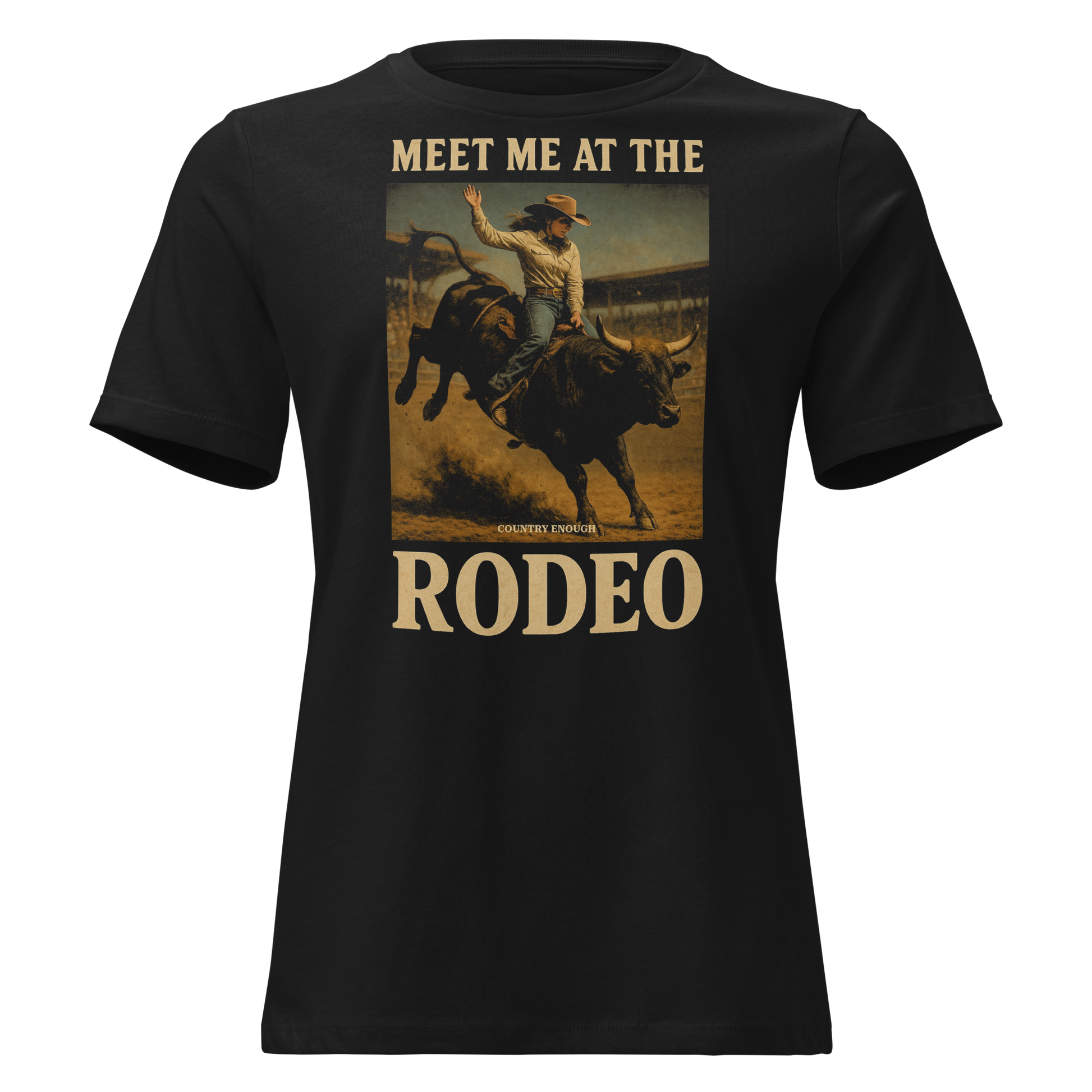 Black t-shirt with graphic of cowgirl riding a bucking bull and the words meet me at the rodeo #black